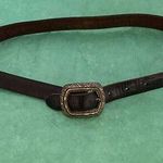 Ladies leather reversible belt black and brown with embellishments. Size med/30. Photo 0