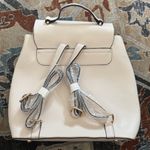 Stylish Cream Backpack with Gold Accents Photo 5