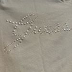 Guess Women’s XS Cold Shoulder. White Faux Pearl Logo Long-Sleeve Top. Photo 7