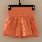 Free people movement shorts bright orange size S Photo 0