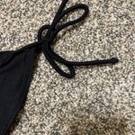No Boundaries  Black String Bikini Bottoms Photo 3