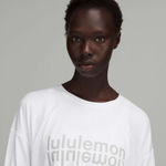 Lululemon  Muscle Love Long Sleeve Motif Logo White Oversized Crop Photo 0