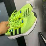 Adidas Neon Green Athletic Shoes with Black Stripes Photo 9