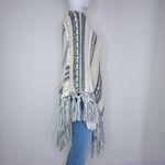 Akira  slanted stripe poncho‎ with fringe edge Photo 12