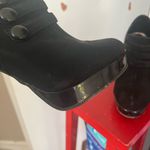 Unlisted Stiletto with button down sides. Black suede and patten leather Photo 2