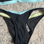 PINK - Victoria's Secret Victoria's Secret PINK Bikini neon/black block style colors woman's size L/XL Photo 1