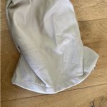 Maniere De Voir - Tacked Faux Leather Flared Trousers in Beige Photo 5