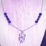 Puzzle Piece Blue Jewel Necklace Photo 0