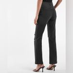 EXPRESS High Waisted Black Ripped 90s Bootcut Jeans Photo 3