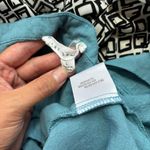 Jane and Delancey Solid Blue V-Neck Short Sleeve High Low Envelope Hem Blouse Photo 1