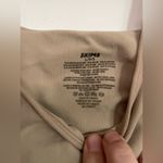 SKIMS Sculpting Bodysuit in Beige - Size Large Photo 1