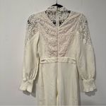 Ivy City Co Colette Cream Long Sleeve High Neck Lace Jumpsuit XXS White Photo 9