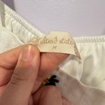 Altar'd State Altar’d State embroidered sunflower flowy tank top Photo 1