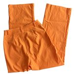 SheIn orange pants with hip cut out Photo 11