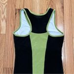 Nanette Lepore So Sporty a brand under . It features a black body with green trim Photo 5