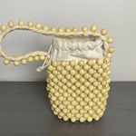 Aerie Beaded Bucket Bag Purse in Natural Photo 1