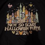 Gildan Join the fun with this  Not So Scary Halloween Party 2024 sweatshirt. Features playful graphics in black. Photo 1