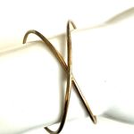 Gold tone cut out open cuff bracelet Photo 1