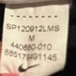 Nike Womens medium  Dri Fit Cropped wide leg athletic leggings  Photo 5