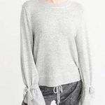 Iris Gray Bow sleeve Sweater. Size Medium Photo 3