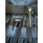 Bebe Women's Black Flowy Ballerina Skirt Size Small Zipper Back Elastic Wasit Photo 2