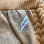 DOYOUEVEN  Seamless Athletic Butt Lift Orange White Leggings Size Large EUC #7043 Photo 1