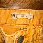 Free People Orange Ankle Cropped Pants Photo 1