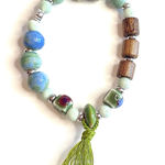 Green Tassel Bracelet Blue White Silver Wood Swirl Ceramic Beads Elastic Stretchy Multiple Photo 0