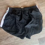 None Black and white athletic running shorts Photo 1