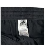 Adidas - Essentials Warm Up Open Hem 3 Stripes Track Pants in Black & White Photo 1
