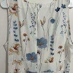 White dress with flowers. Used but in good condition. Size 14 Photo 3