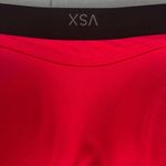 Victoria's Secret Victoria’s Secret VSX Padded Sports Bra in Pink with Black trim. Photo 1