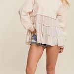 Pink Lily Ivory crew neck long sleeve ruffle tiered hem top Photo 0