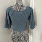 Urban Outfitters Outfitter Medium Powder Blue Twist Cropped Top. Raw Hem. Balloon Sleeves. Photo 2