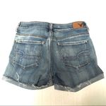 American Eagle  Outfitters midi distressed light wash denim shorts size 4 Photo 1