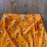 orange and white floral midi wrap skirt Size 6 Photo 1