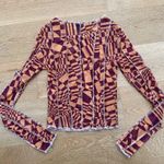 Omighty Exposed Seam Geometric Mesh Long Sleeve Crop Top in Orange Photo 3