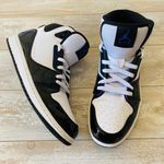 Nike Air Jordan Black and Purple High Top Sneakers Photo 1