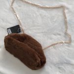 Forever 21 New Grossi faux fur handbag/crossbody bag from Photo 1