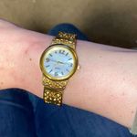 Women's Gold Tone Bangle Bracelet Watch with Intricate Detail, MOP Face Gold Photo 0