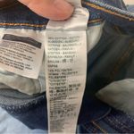 Levi's  size 29 Ribcage bell dark wash denim jeans raw hem flare retro Photo 6