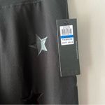 Jessica Simpson  The Warm Up Black Star Leggings Size XL NWT Photo 1