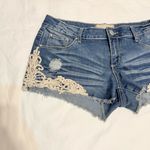 Almost Famous  brand jean shorts size M/L approximately Photo 3