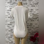 A New Day White Short Sleeve Bodysuit Photo 1