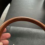 Adrienne Vittadini black leather purse with brown accents. Used good condition. Photo 1