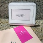 Kate Spade  Bifold Wallet In Parchment​ Photo 1