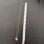 Elegant Silver Necklace with Rose Gold Accents Photo 1