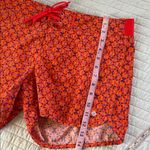 Columbia women’s Omni shield orange Geo printed board shorts large Photo 0
