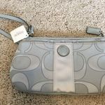 Coach signature fabric gray / silver oversized wristlet NWT Photo 0