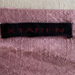 XTaren Adorable pink mini dress, tiered ruffle bottom, sleeveless, 55% rayon and 45% polyester, excellent condition, size large  Measurements:  Bust: armpit to armpit 19 inches  Length: shoulder seam to bottom 31 inches Photo 6